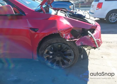 2023 Tesla Model Y Awd/Long Range Dual Motor All-Wheel Drive z USA, uszkodzony, nr VIN 7SAYGDEE0PA165391